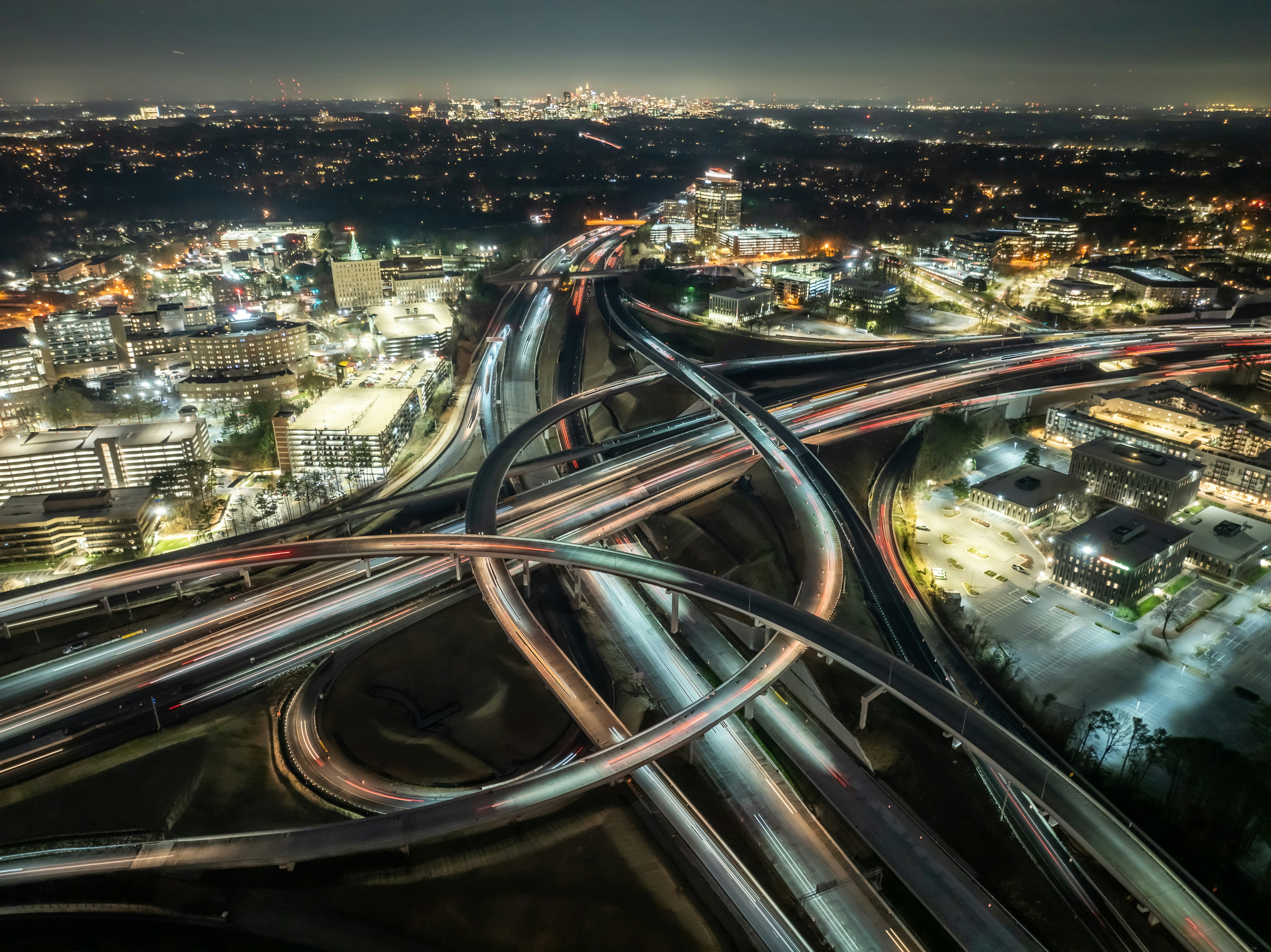 Aerial highway intersection at night